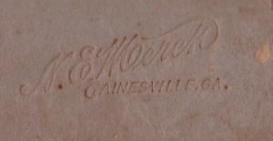 Merck, N.E. photo mat mark