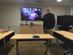John Edwin Mason, University of Virginia, standing, and via Skype, Scott French, University of Central Florida; photo by E. Lee Eltzroth
