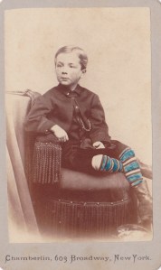 Hand-tinted Carte de visite by Chamberlin, 603 Broadway, New York, of an unidentified boy. 